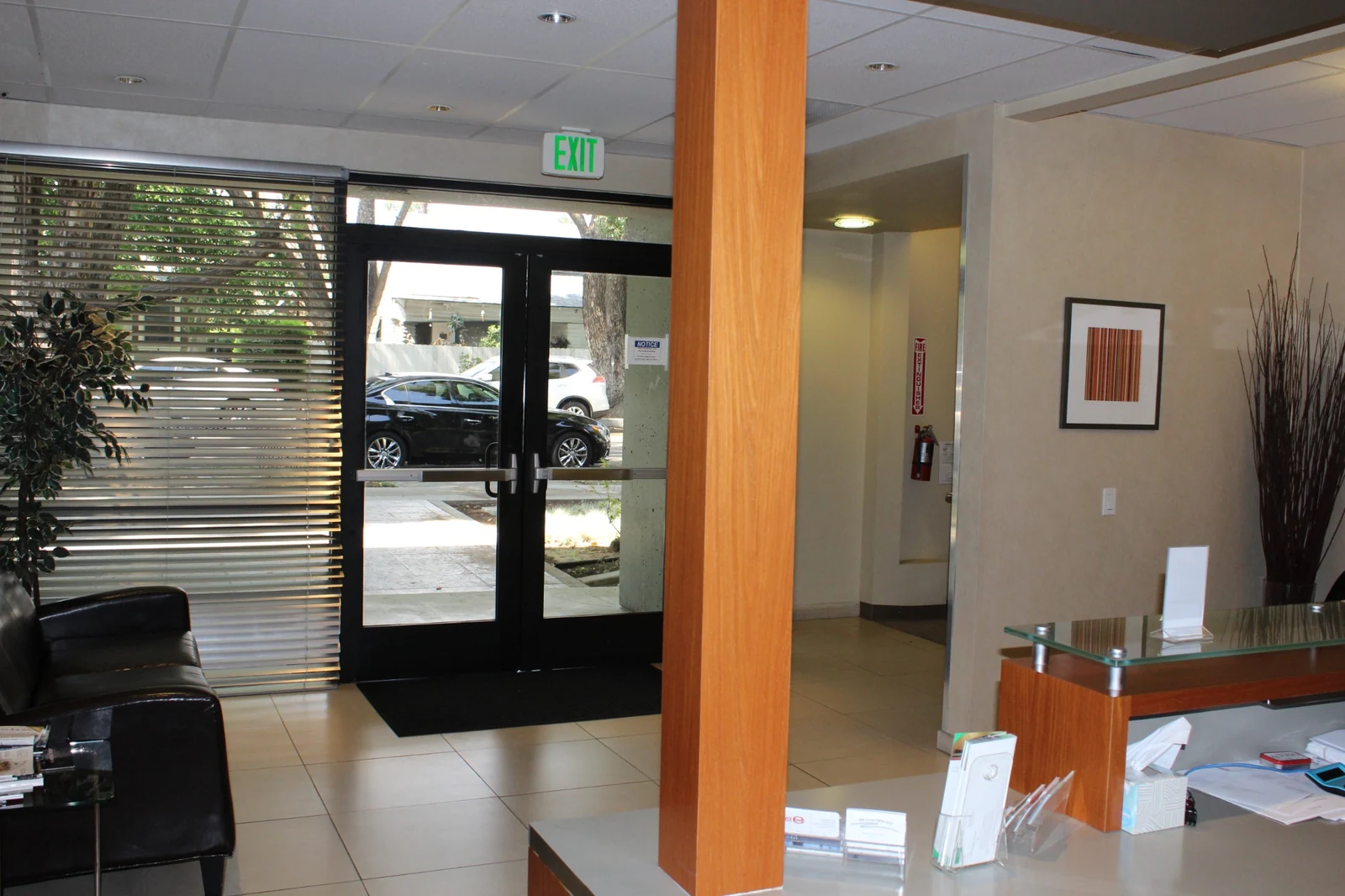 Entrance lobby at Gateway Executive Suites, 500 East E Street with glass doors, lounge seating and reception counter