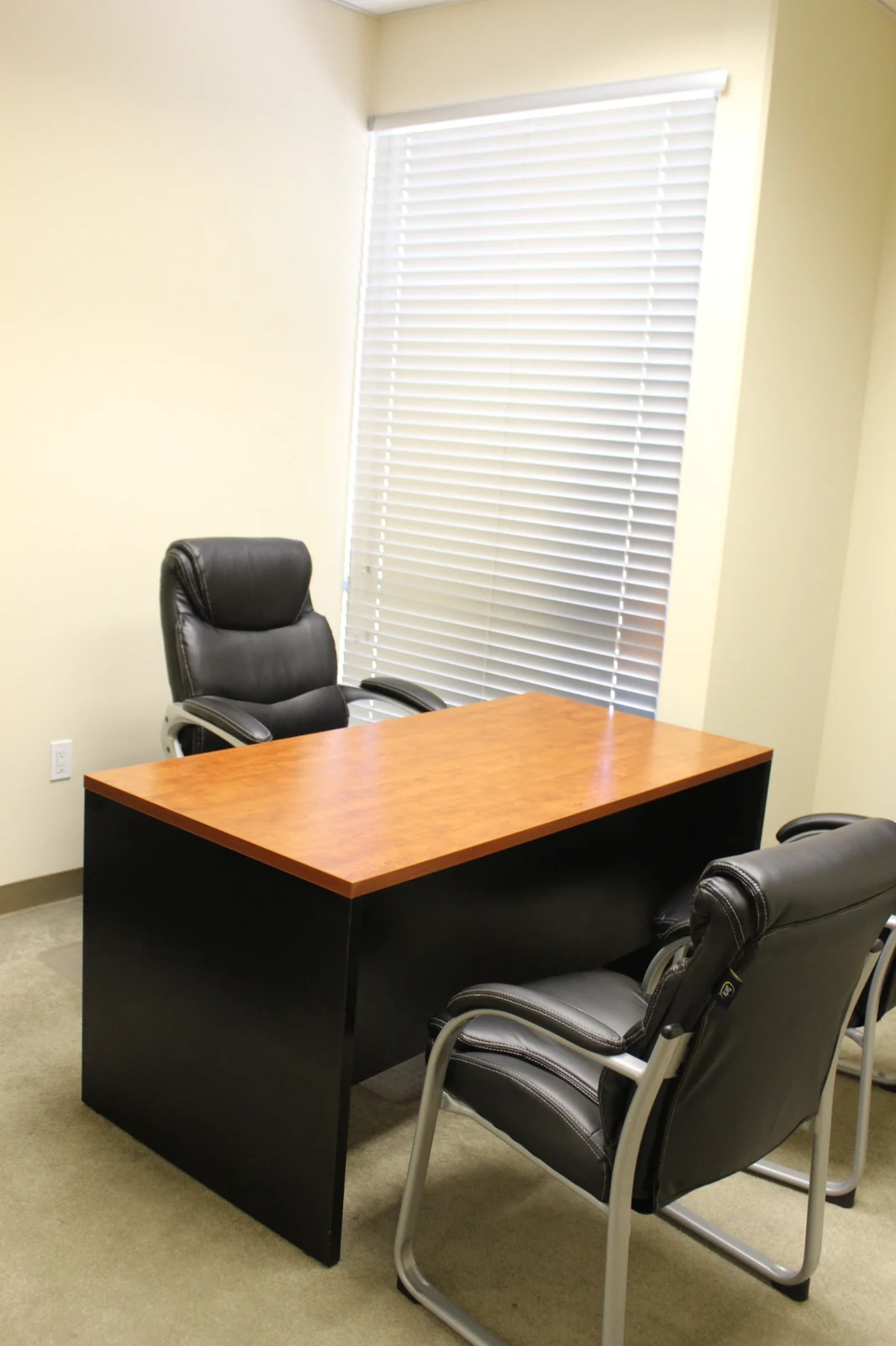 Gateway Executive Suites: furnished office with desk and guest seating at 500 East E Street