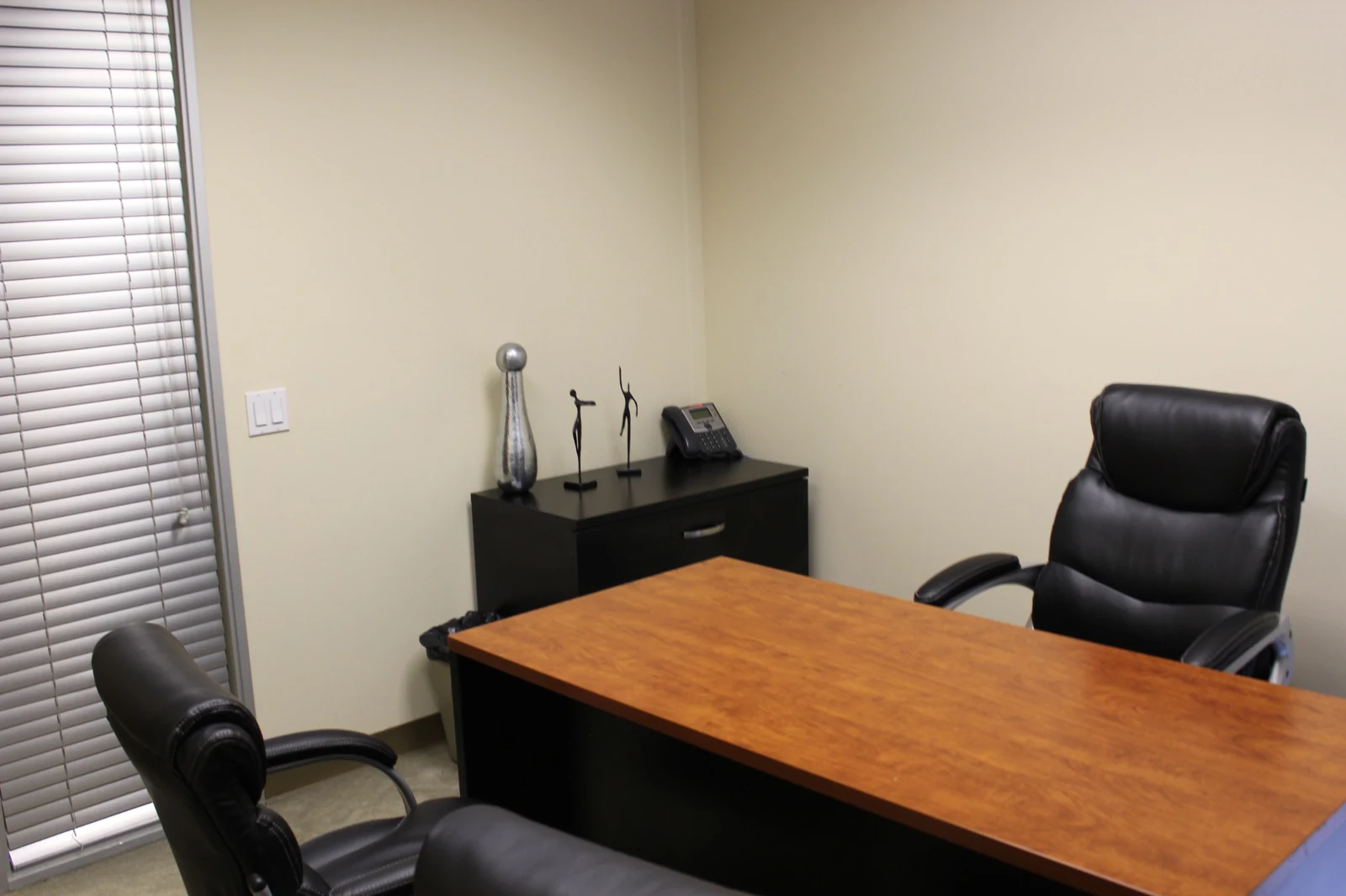 Office desk and cabinet at Gateway Executive Suites, 500 East E Street; furnishing is available for an additional fee