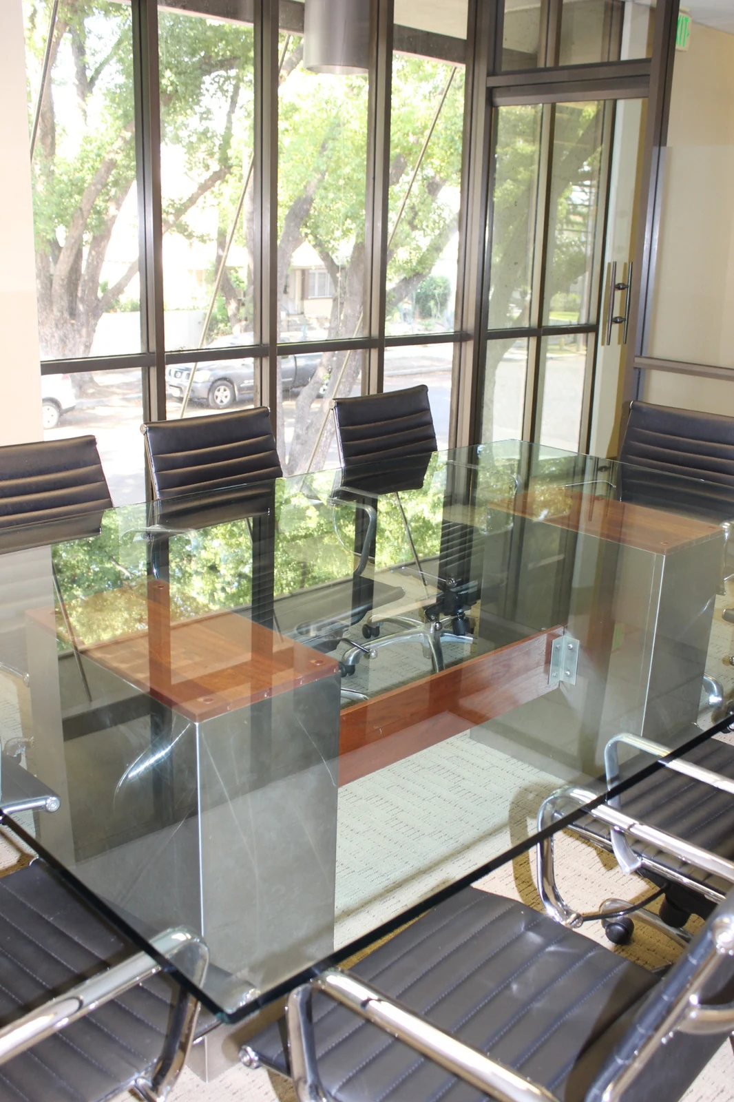 Meeting room at Gateway Executive Suites, 500 East E Street with glass table and windows