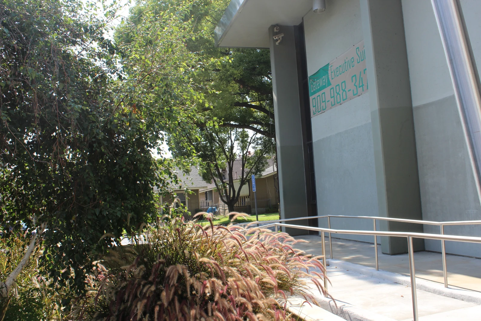Landscaping and walkway beside the entrance at Gateway Executive Suites, 500 East E Street