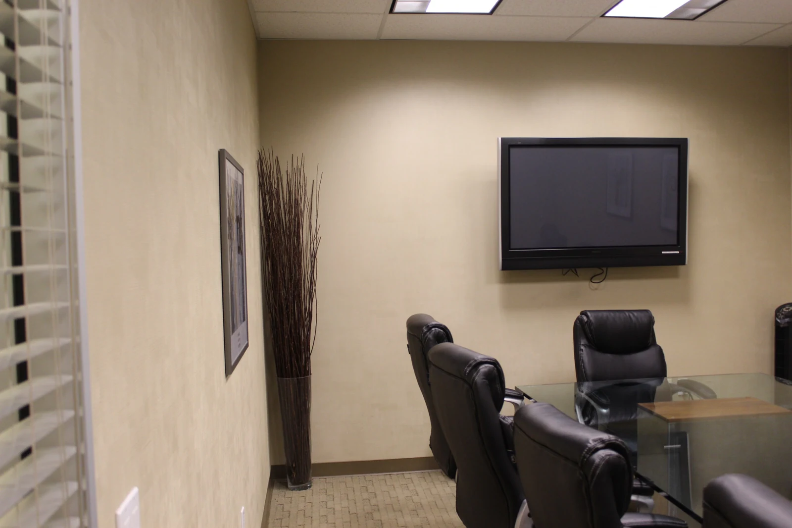 Wall-mounted display and seating at Gateway Executive Suites, 500 East E Street