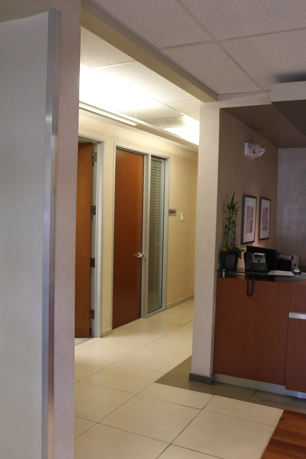 Reception desk beside the office corridor at Gateway Executive Suites, 500 East E Street